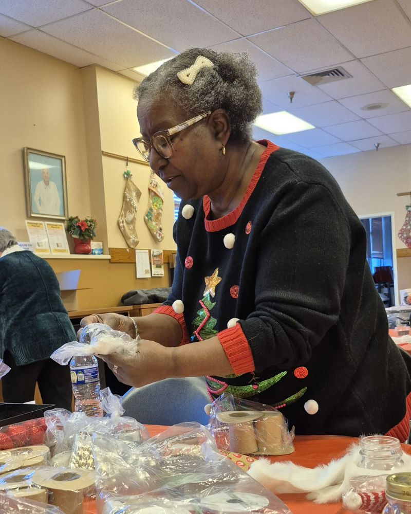 Photo of woman at the holiday crafting event.